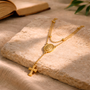 Collier chapelet croix dorée
