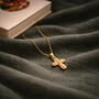 Collier croix arrondie dorée