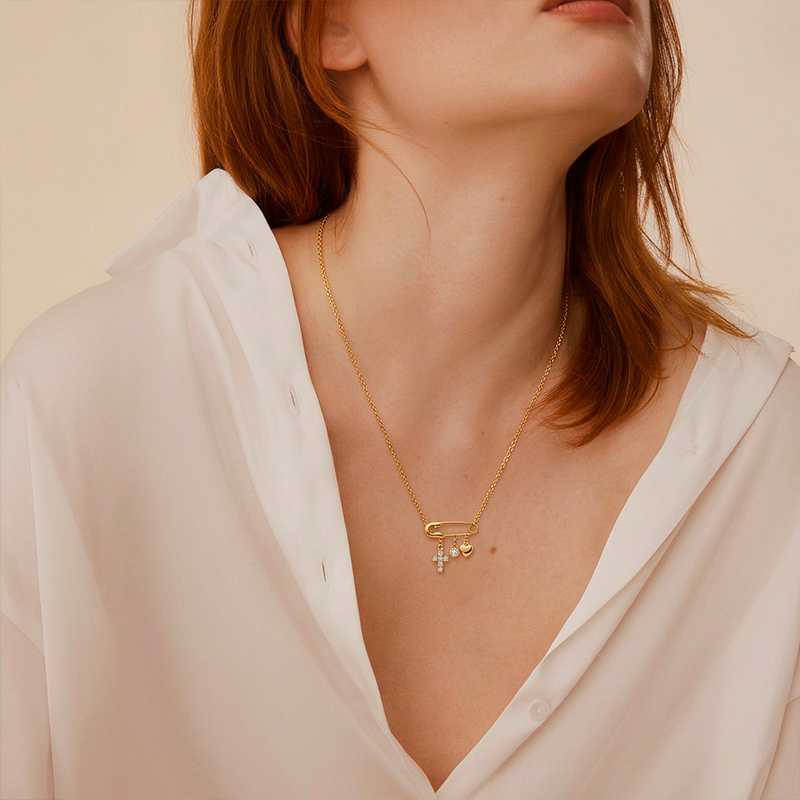 Collier croix épingle dorée