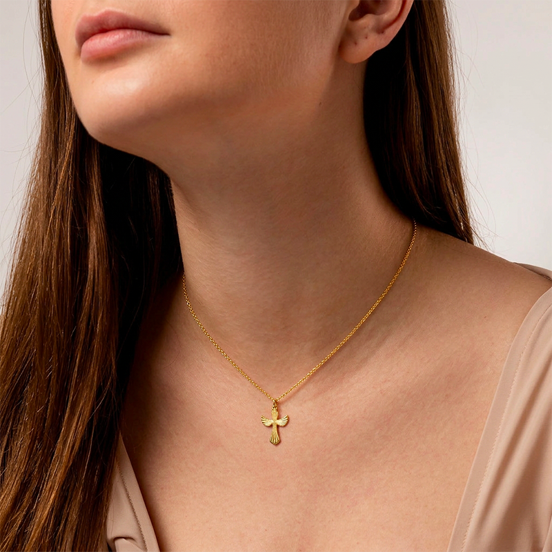 Pendentif croix ciselé dorée