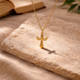 Pendentif croix ciselé dorée